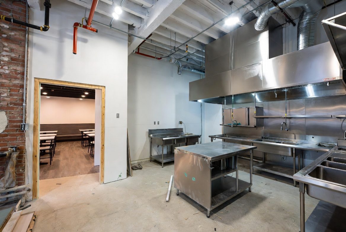 Restaurant kitchen build-out during a retail-to-restaurant change of use