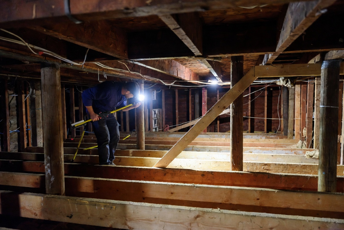 Illustration of sagging floor framing being assessed